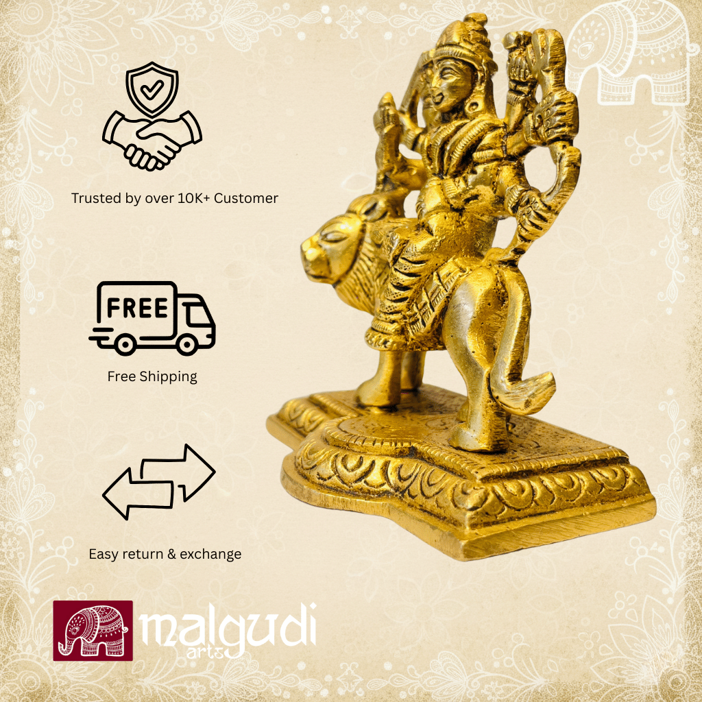 Brass Durga atop lion statue
