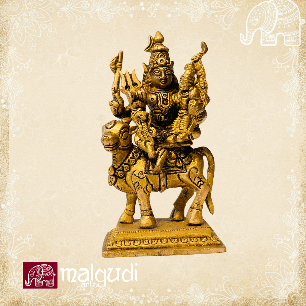 Brass statue of Shiva and Parvati sitting on nandhi