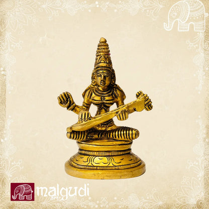 Brass statue of Saraswati playing veena
