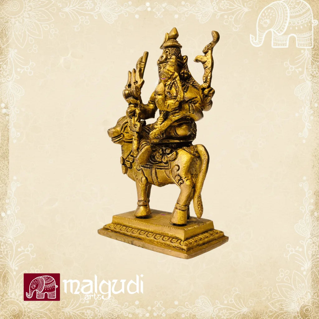 Brass statue of Shiva and Parvati sitting on nandhi