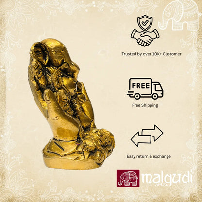 Golden Ganesha between open hands, 100% Brass