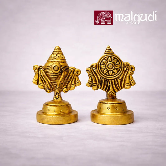 Intricately carved brass Shanq & chakra stands