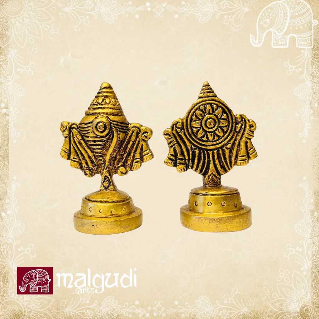 Intricately carved brass Shanq & chakra stands