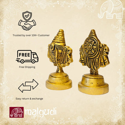 Intricately carved brass Shanq & chakra stands