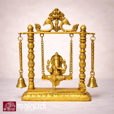 Ornate brass Ganesh on swing, with chain and bells