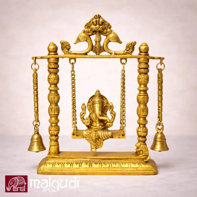 Ornate brass Ganesh on swing, with chain and bells