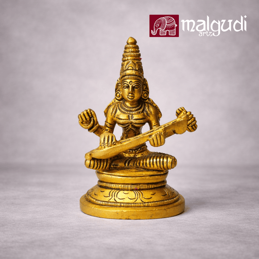 Brass statue of Saraswati playing veena