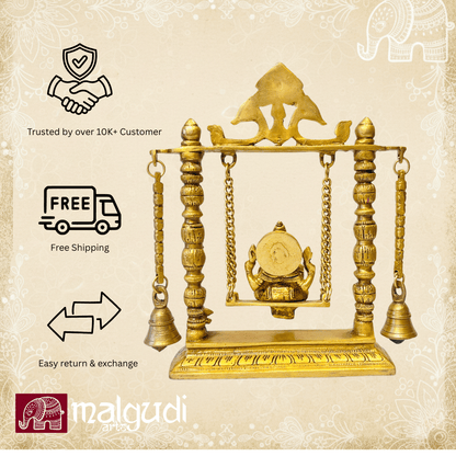 Ornate brass Ganesh on swing, with chain and bells
