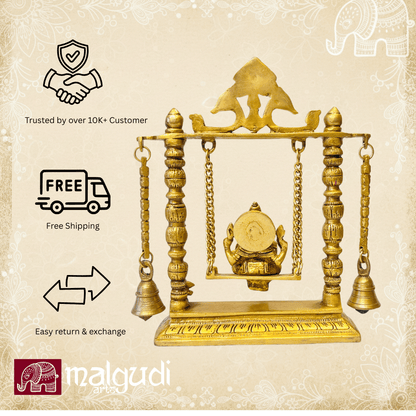Ornate brass Ganesh on swing, with chain and bells