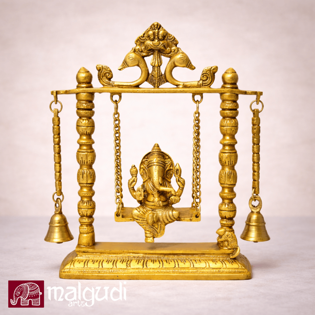 Ornate brass Ganesh on swing, with chain and bells