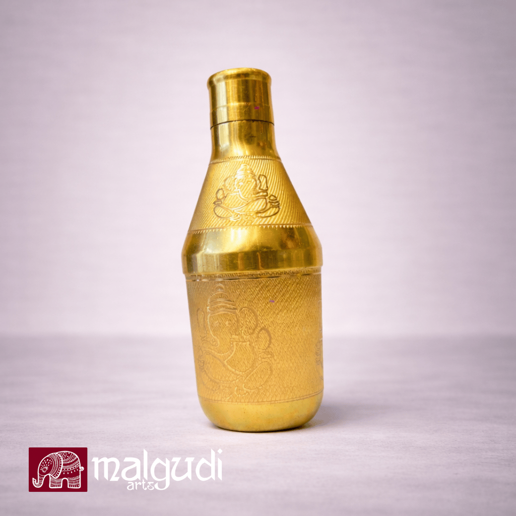 Engraved brass vessel with Ganesha designs