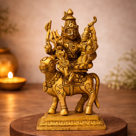 Brass statue of Shiva and Parvati sitting on nandhi